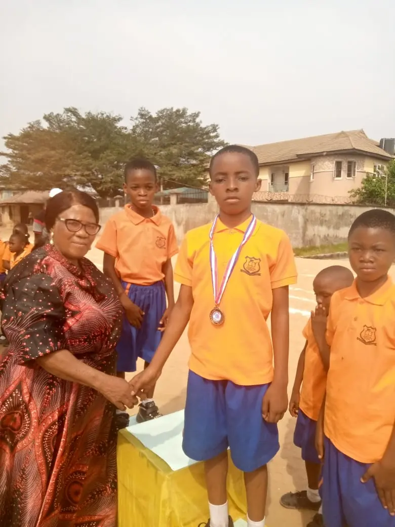 A pupil receiving a medal on prize-giving day